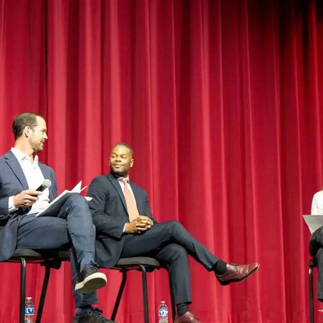 Former Teammates Reunite on Stage for Civil Dialogue